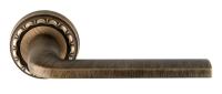 Дверная ручка Extreza  TERNI (Терни) 320  на розетке R02, цвет матовая бронза F03