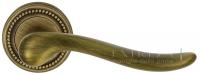 Дверная ручка Extreza "TOLEDO" (Толедо) 323 на розетке R03 матовая бронза F03