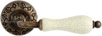 Дверная ручка Extreza "DANA CRACKLE" (Дана кракле) 306 на розетке R04 античная бронза F23
