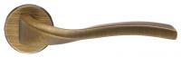 Дверная ручка Extreza Hi-tech Slim "PERLA" (Перла) 114 на круглой розетке R12 матовая бронза